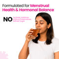 Woman drinking FemEva+ Ras Ayurvedic tonic for menstrual health and hormonal balance by Him Arogya. Natural supplement with no additives or sugar.
